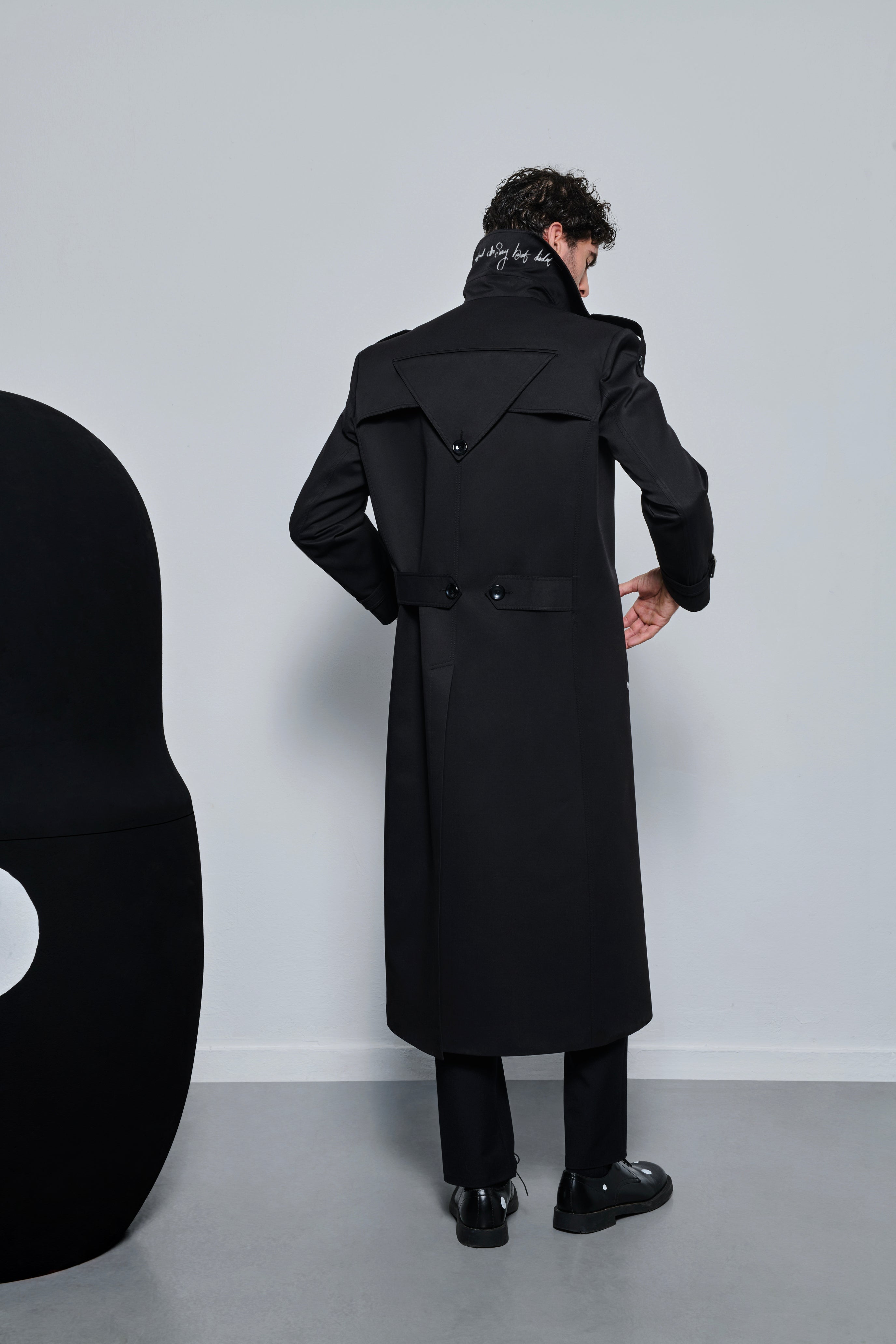 Words Unspoken Trench Coat
