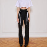 Her White Pleat Pants
