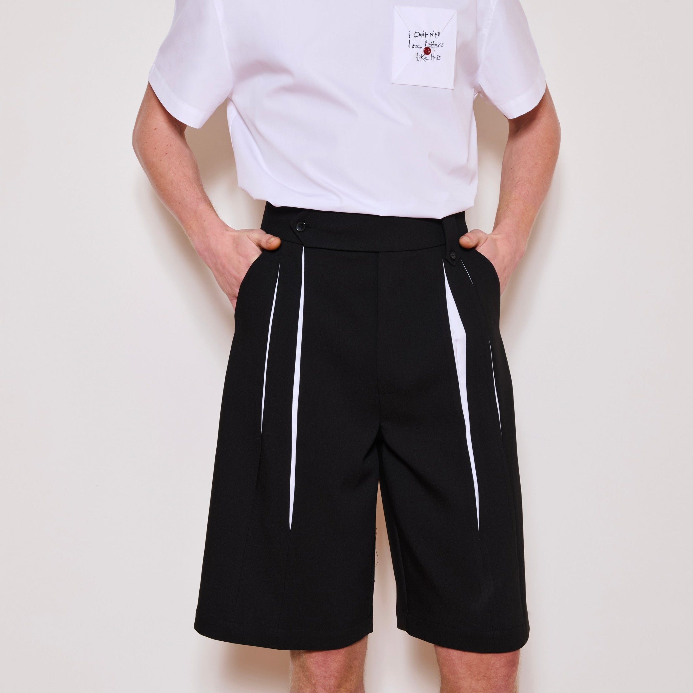His White Pleat Shorts
