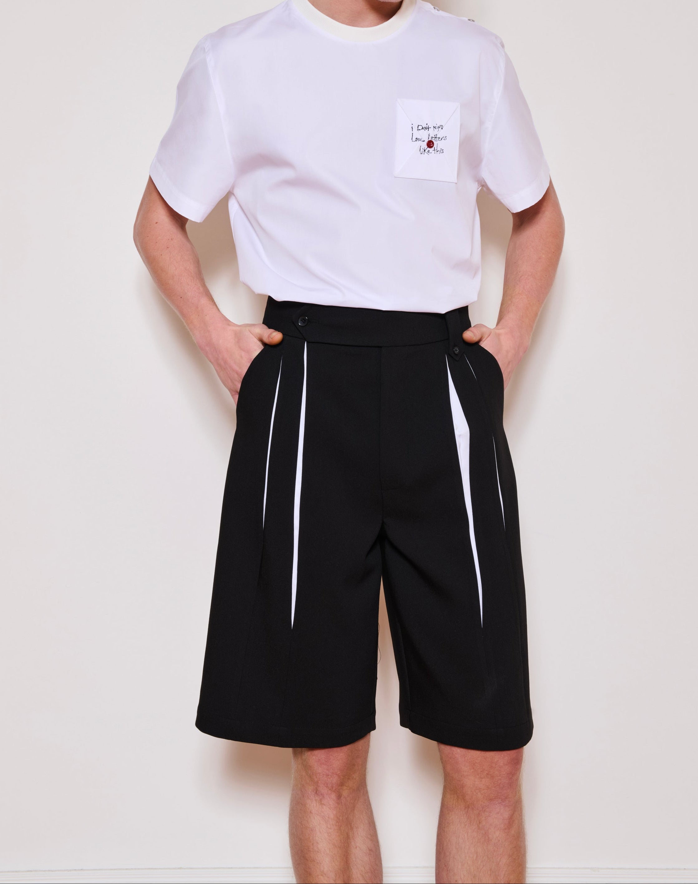 His White Pleat Shorts

