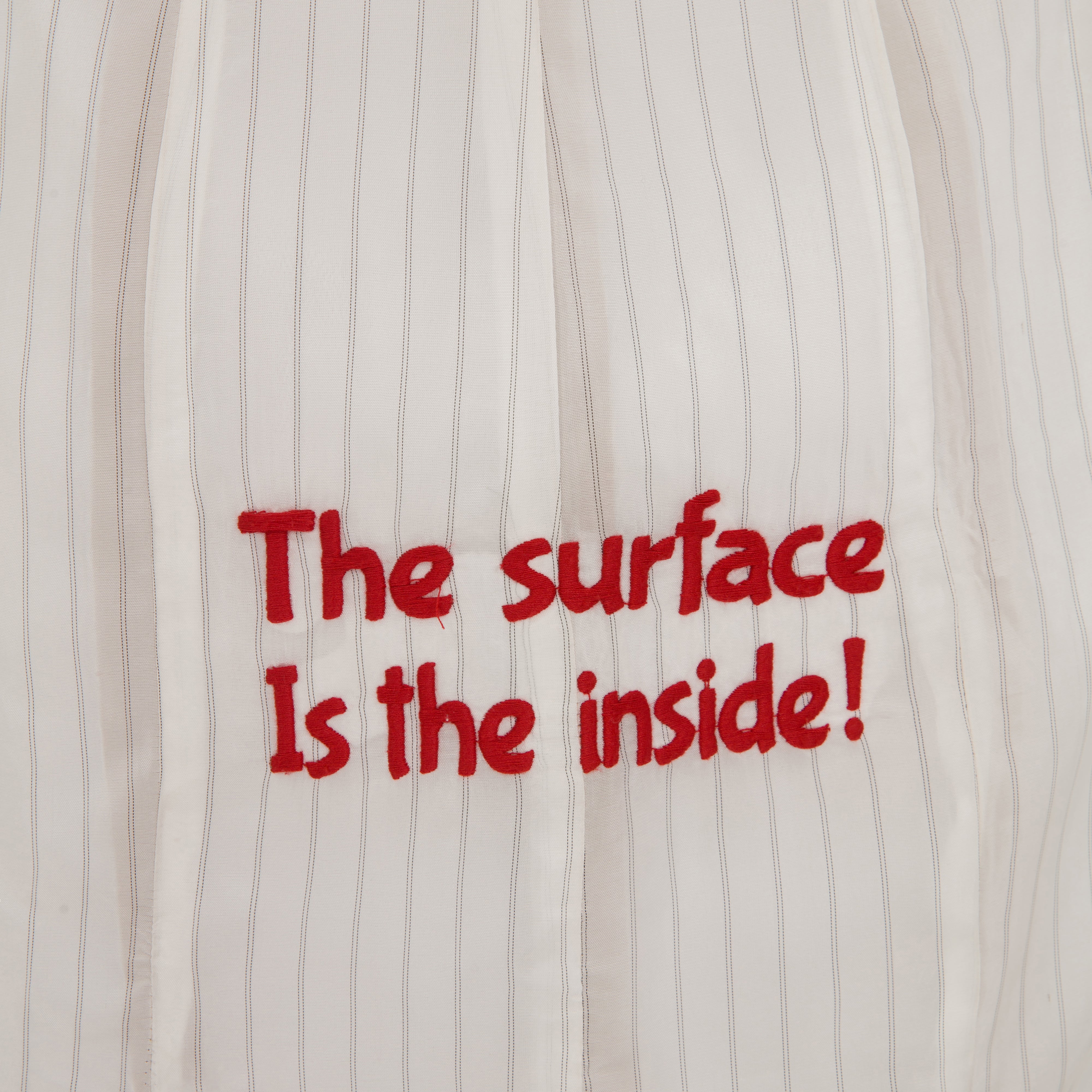 معطف ترنش سيمفوني غير مكتمل
